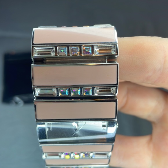Pink Swarovski crystal Guess watch.